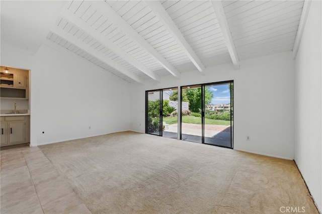 4424 Park Jazmin, Calabasas, CA 91302 - unfurnished room featuring a sink, light colored carpet, beam ceiling, high vaulted ceiling, and baseboards