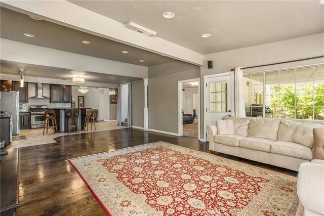 11425 Bryant St, Yucaipa, CA 92399 - living area featuring recessed lighting, wood finished floors, and baseboards