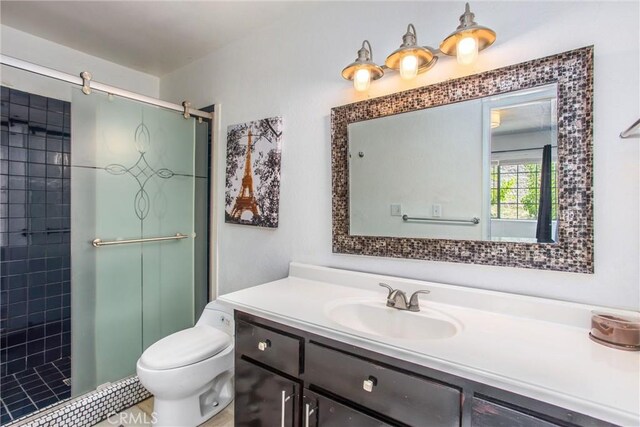 11425 Bryant St, Yucaipa, CA 92399 - full bathroom featuring a stall shower, vanity, and toilet