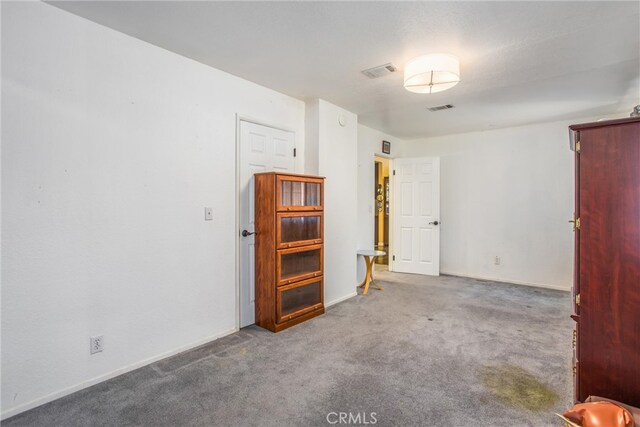 11425 Bryant St, Yucaipa, CA 92399 - carpeted empty room with baseboards
