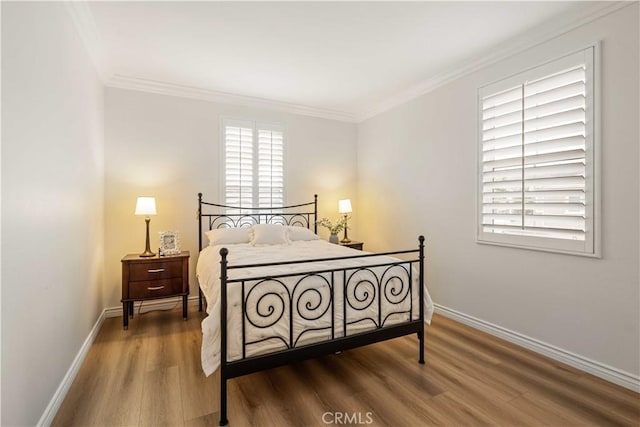23911 Brio Ct, Valencia, CA 91354 - bedroom with wood finished floors, baseboards, and ornamental molding