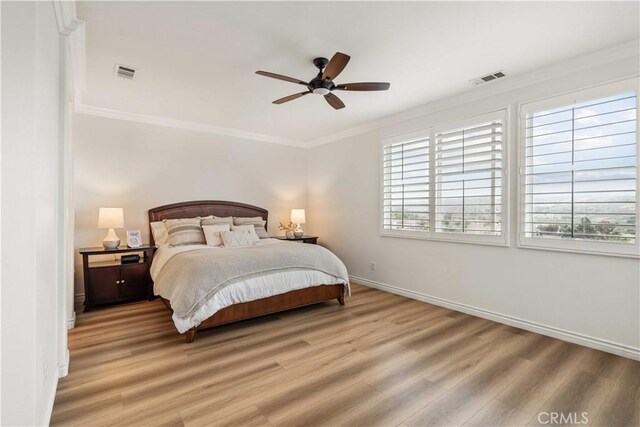 23911 Brio Ct, Valencia, CA 91354 - bedroom with light wood-style flooring, ornamental molding, baseboards, and a ceiling fan