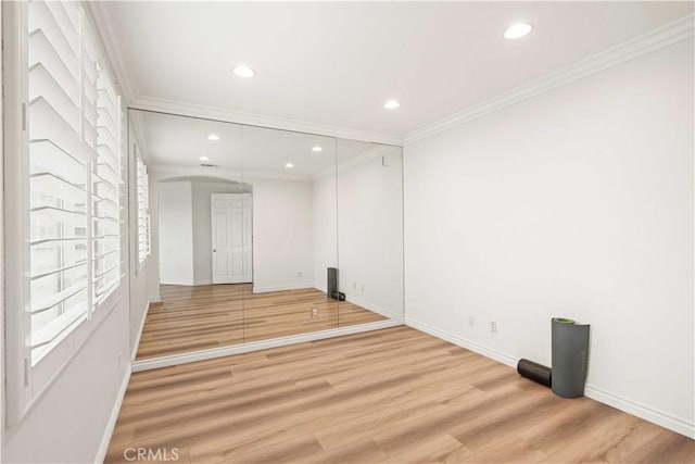23911 Brio Ct, Valencia, CA 91354 - unfurnished room with baseboards, light wood-type flooring, crown molding, plenty of natural light, and recessed lighting