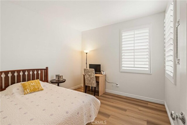 23911 Brio Ct, Valencia, CA 91354 - bedroom featuring light wood finished floors and baseboards