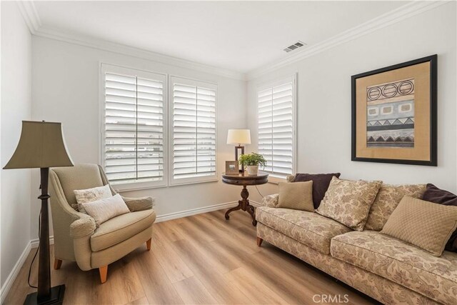 23911 Brio Ct, Valencia, CA 91354 - living room featuring light wood-style flooring, crown molding, and baseboards