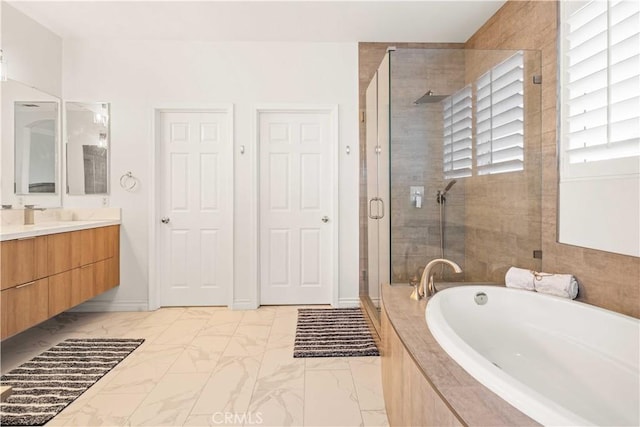 23911 Brio Ct, Valencia, CA 91354 - full bathroom featuring marble finish flooring, a stall shower, a garden tub, and vanity