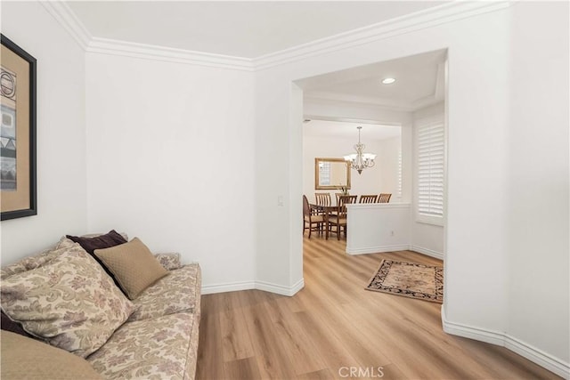 23911 Brio Ct, Valencia, CA 91354 - living area featuring wood finished floors, a chandelier, ornamental molding, baseboards, and recessed lighting