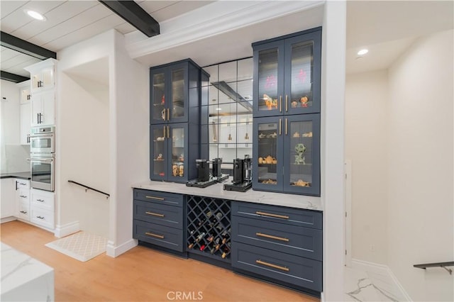 451 Avenida Esplendor, Walnut, CA 91789 - indoor bar featuring beamed ceiling, baseboards, double oven, recessed lighting, and light wood-style flooring