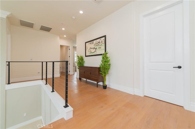 451 Avenida Esplendor, Walnut, CA 91789 - hallway featuring an upstairs landing, light wood-type flooring, recessed lighting, and baseboards