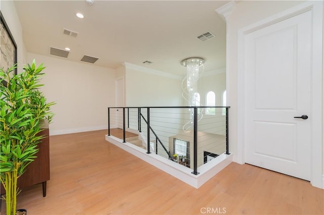 451 Avenida Esplendor, Walnut, CA 91789 - corridor featuring an upstairs landing, light wood-type flooring, crown molding, and recessed lighting
