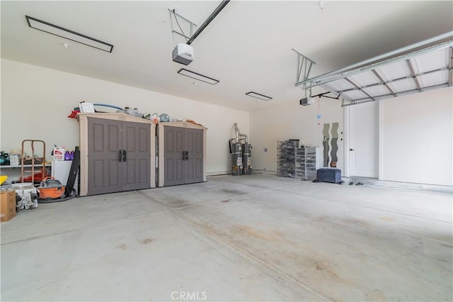 451 Avenida Esplendor, Walnut, CA 91789 - garage featuring a garage door opener, strapped water heater, and a storage unit