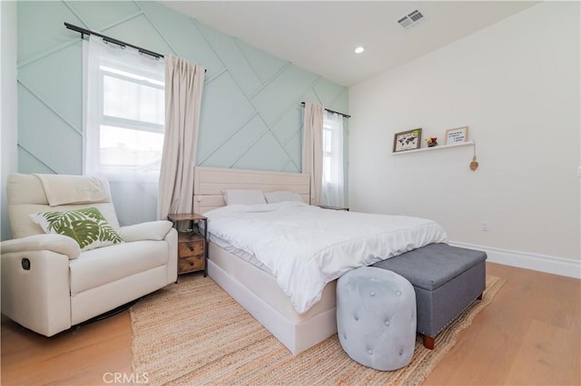 451 Avenida Esplendor, Walnut, CA 91789 - bedroom featuring wood finished floors, baseboards, recessed lighting, and an accent wall