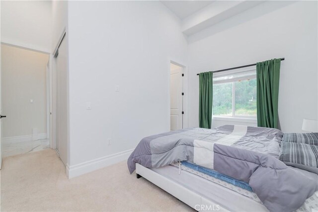 451 Avenida Esplendor, Walnut, CA 91789 - carpeted bedroom featuring baseboards and a towering ceiling