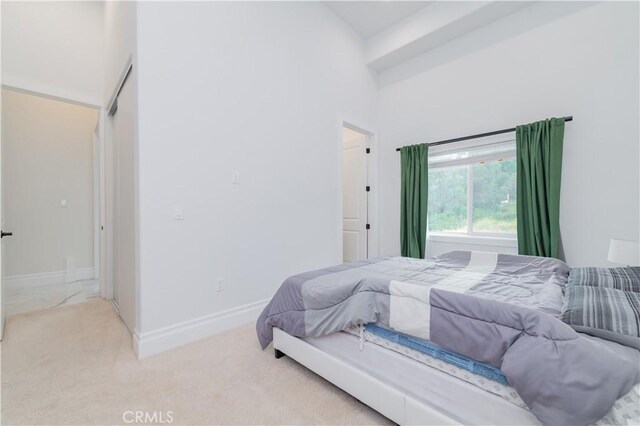 451 Avenida Esplendor, Walnut, CA 91789 - carpeted bedroom with baseboards and a towering ceiling