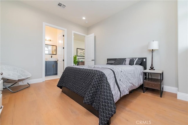 451 Avenida Esplendor, Walnut, CA 91789 - bedroom featuring light wood finished floors, baseboards, a sink, recessed lighting, and connected bathroom