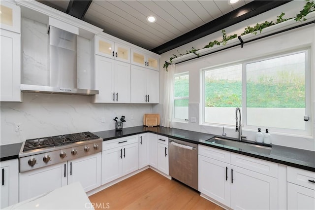 451 Avenida Esplendor, Walnut, CA 91789 - kitchen with stainless steel appliances, a sink, wall chimney exhaust hood, light wood finished floors, and wood ceiling