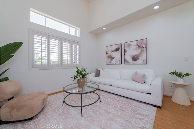 338 Calle Vis, Walnut, CA 91789 - living area featuring wood finished floors, recessed lighting, and a high ceiling