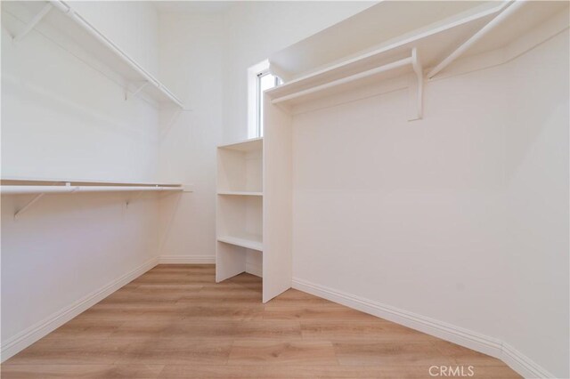 338 Calle Vis, Walnut, CA 91789 - spacious closet featuring wood finished floors