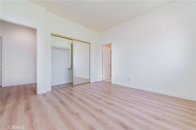 338 Calle Vis, Walnut, CA 91789 - unfurnished bedroom with light wood-style flooring and a closet