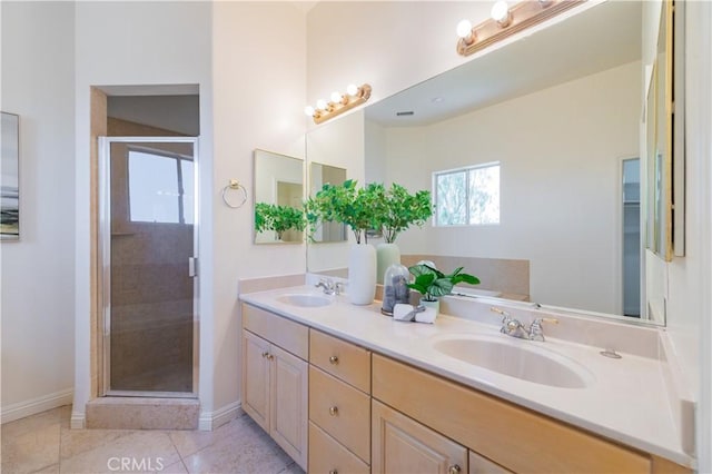 338 Calle Vis, Walnut, CA 91789 - bathroom featuring double vanity, a shower stall, and tile patterned flooring