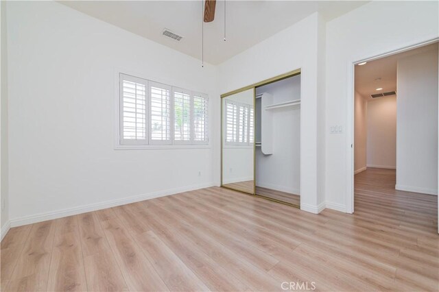 338 Calle Vis, Walnut, CA 91789 - unfurnished bedroom featuring light wood-style floors, a closet, and ceiling fan