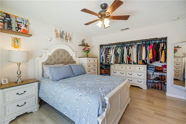 3263 Green Canyon Rd, Fallbrook, CA 92028 - bedroom with light wood finished floors, a ceiling fan, and a closet