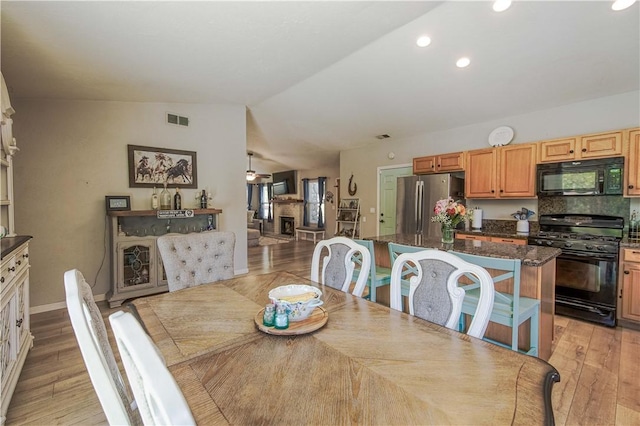 3263 Green Canyon Rd, Fallbrook, CA 92028 - dining space featuring light wood-style floors, lofted ceiling, and recessed lighting