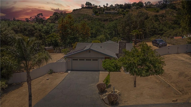 3263 Green Canyon Rd, Fallbrook, CA 92028 - view of front facade featuring asphalt driveway, fence, a gate, and a garage