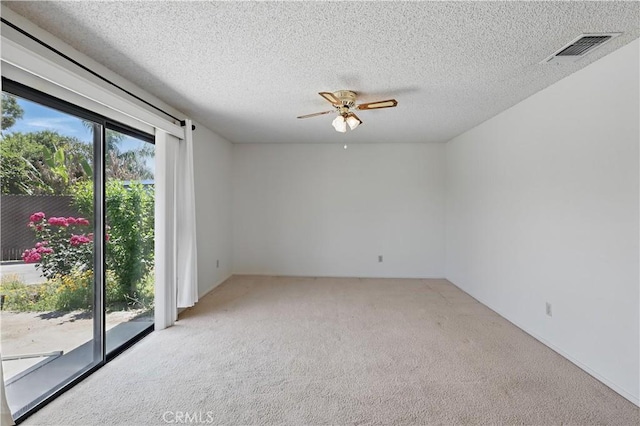442 R St, Merced, CA 95341 - carpeted empty room featuring a ceiling fan and a textured ceiling