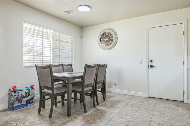 15025 Avenida Ramada, Desert Hot Springs, CA 92240 - dining area featuring baseboards