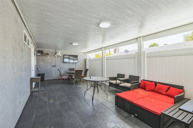 15025 Avenida Ramada, Desert Hot Springs, CA 92240 - sunroom featuring outdoor lounge area and outdoor dining space