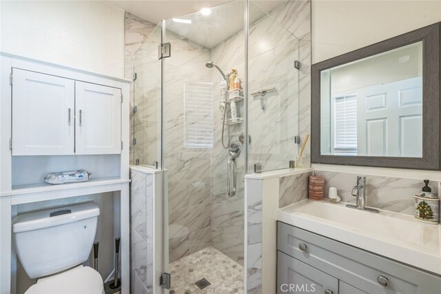 15025 Avenida Ramada, Desert Hot Springs, CA 92240 - full bath featuring toilet, a shower stall, and vanity