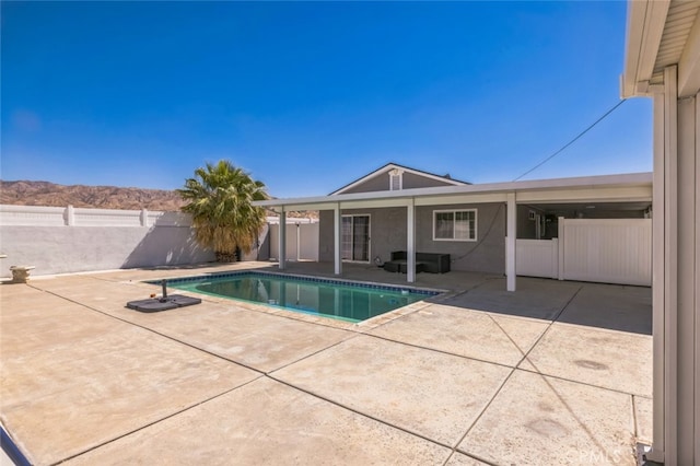 15025 Avenida Ramada, Desert Hot Springs, CA 92240 - view of swimming pool featuring a patio area and a fenced backyard