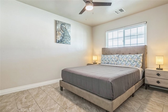 15025 Avenida Ramada, Desert Hot Springs, CA 92240 - bedroom with baseboards, light tile patterned floors, and ceiling fan