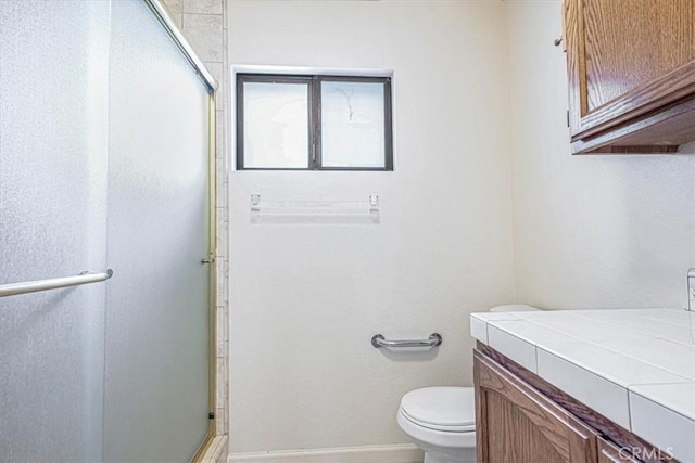 420 Via Vicente, Nipomo, CA 93444 - bathroom with an enclosed shower, toilet, baseboards, and vanity