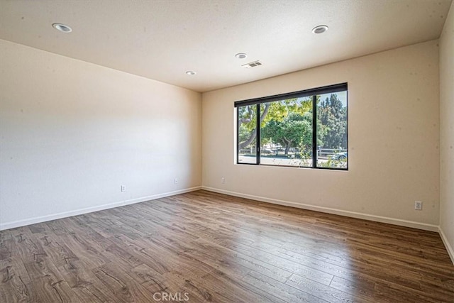 420 Via Vicente, Nipomo, CA 93444 - spare room featuring wood finished floors, baseboards, and recessed lighting