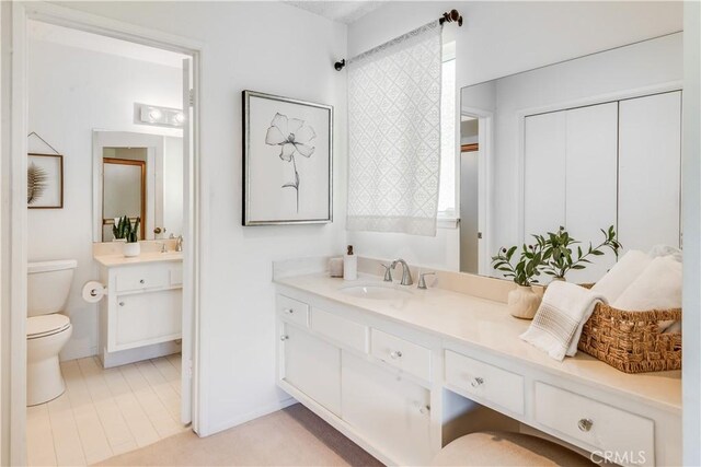 27005 Diamondhead Ln, Rancho Palos Verdes, CA 90275 - full bathroom featuring toilet, vanity, and baseboards