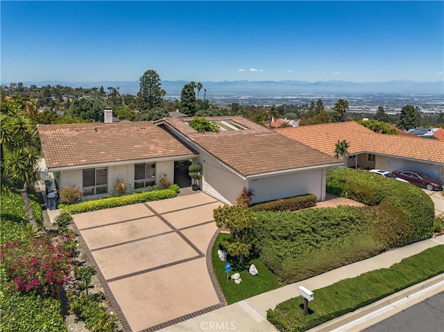 27005 Diamondhead Ln, Rancho Palos Verdes, CA 90275 - single story home featuring a tiled roof, driveway, a chimney, and a garage