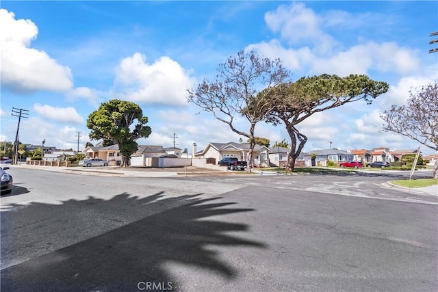 2021 Elanita Dr, San Pedro, CA 90732 - view of asphalt street with a residential view, curbs, and sidewalks