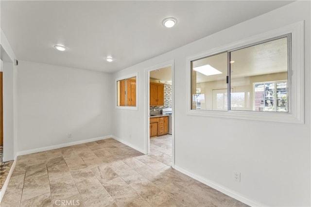 2021 Elanita Dr, San Pedro, CA 90732 - empty room with baseboards, light stone finish flooring, and recessed lighting