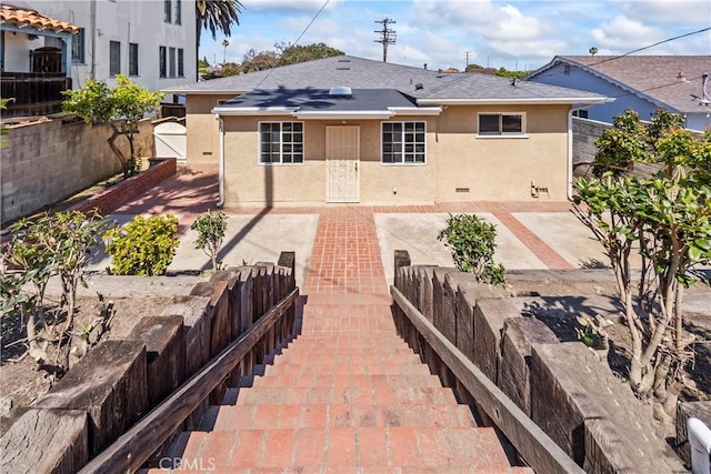 2021 Elanita Dr, San Pedro, CA 90732 - rear view of property featuring stucco siding, a patio, and a fenced backyard