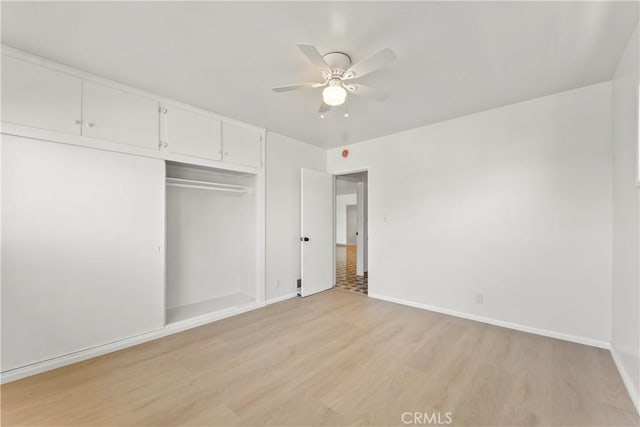 2021 Elanita Dr, San Pedro, CA 90732 - unfurnished bedroom with light wood finished floors, a closet, baseboards, and a ceiling fan