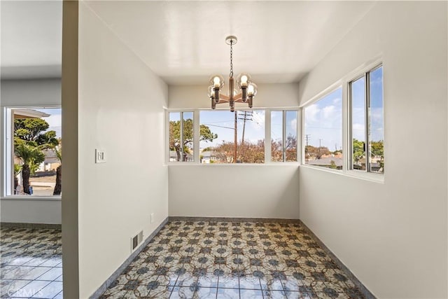 2021 Elanita Dr, San Pedro, CA 90732 - unfurnished dining area with a chandelier, healthy amount of natural light, and baseboards