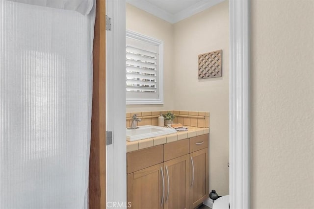 3602 S Walker Ave, San Pedro, CA 90731 - bathroom with vanity, crown molding, and backsplash