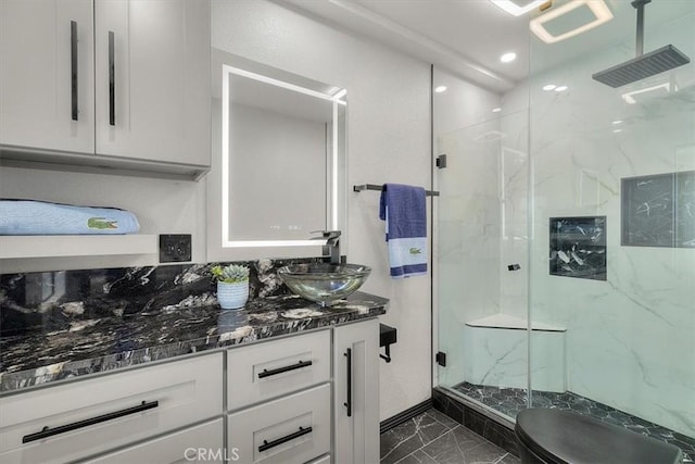 3602 S Walker Ave, San Pedro, CA 90731 - bathroom with marble look tile flooring, a marble finish shower, vanity, and toilet