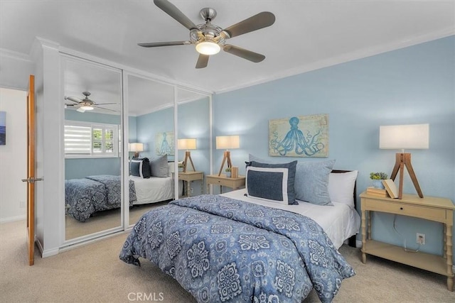 3602 S Walker Ave, San Pedro, CA 90731 - carpeted bedroom with ornamental molding, a ceiling fan, baseboards, and a closet