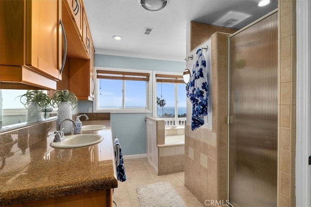 3602 S Walker Ave, San Pedro, CA 90731 - bathroom with a shower stall, tile patterned floors, double vanity, recessed lighting, and crown molding