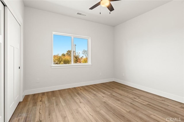 566 Hillcrest Dr, Paradise, CA 95969 - unfurnished bedroom featuring a closet, light wood finished floors, baseboards, and a ceiling fan
