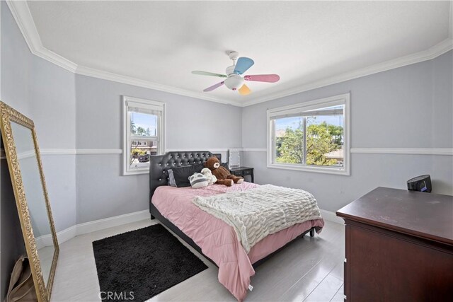 2 Corte Lateuza, Lake Elsinore, CA 92532 - bedroom with crown molding, baseboards, and ceiling fan