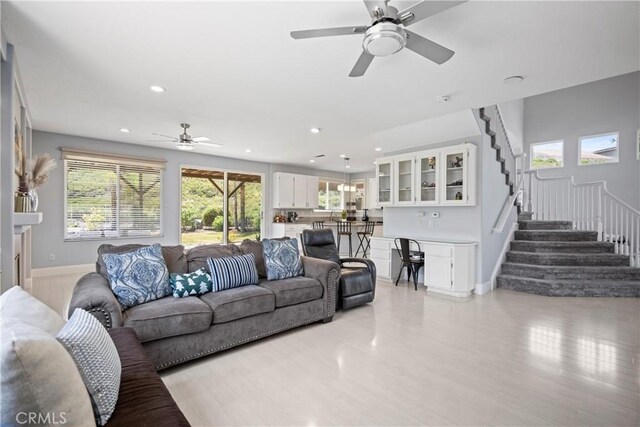 2 Corte Lateuza, Lake Elsinore, CA 92532 - living room with recessed lighting, a ceiling fan, stairs, light wood finished floors, and baseboards